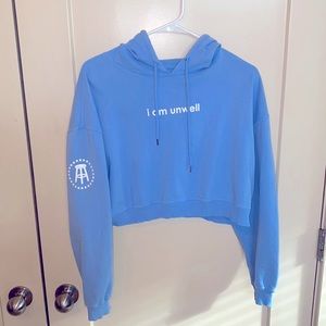 Call Her Daddy “I am unwell” cropped hoodie.